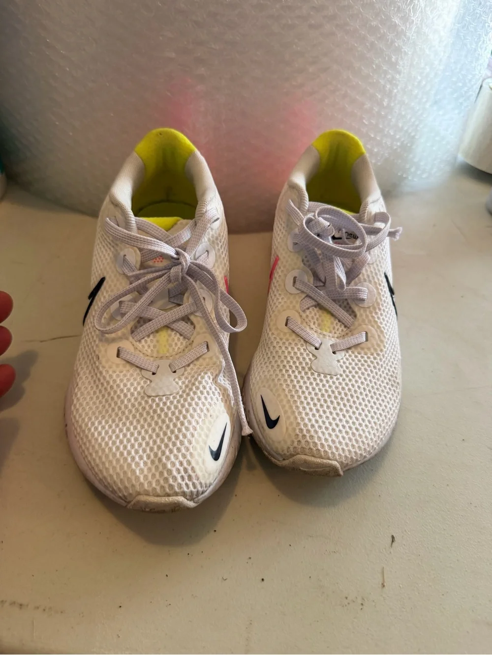 Nike women’s size 7 Renew Running Shoe pink orange yellow